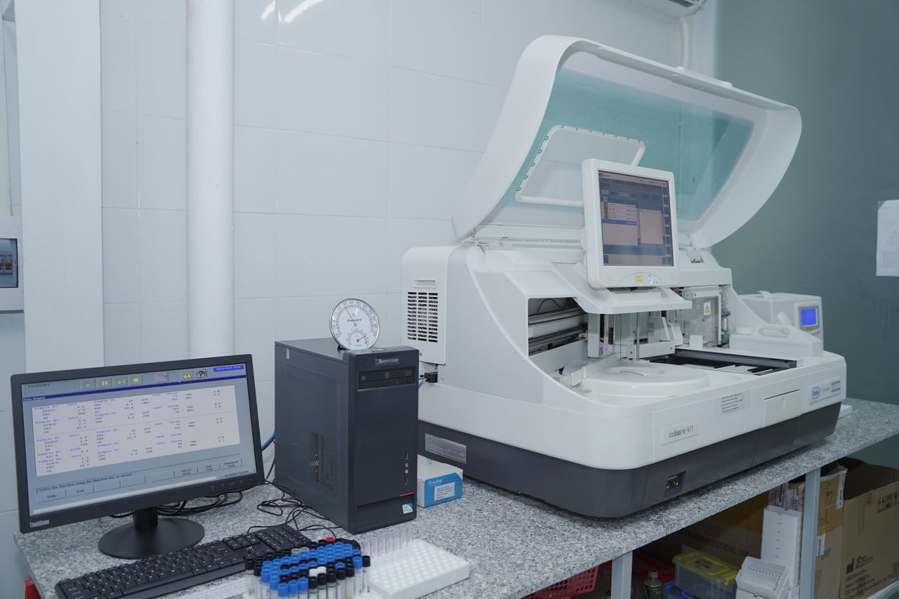 client-satisfaction-img High-tech laboratory equipment with computer system in lab setting.